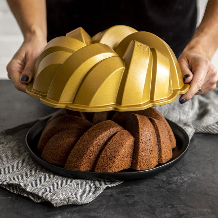 Nordicware braided Bundt pan from the 1104 Bread & Cake Pans collection, showcasing a detailed woven design for baking cakes.