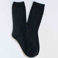 Bright Winter Wool Cashmere Socks in Black on a white background at Addison West