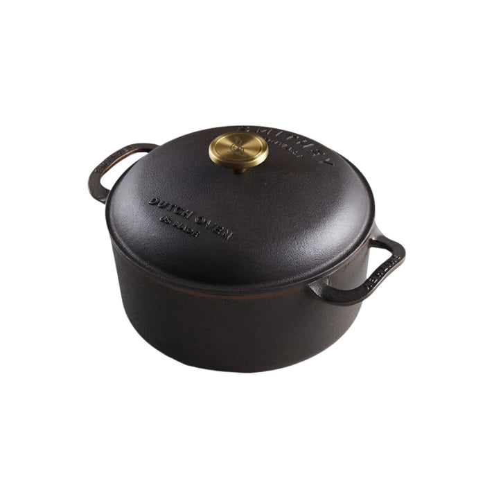 Smithey Ironware 5.5 QT cast iron Dutch oven with lid, sturdy cookware for baking, braising, and slow-cooking in the kitchen.