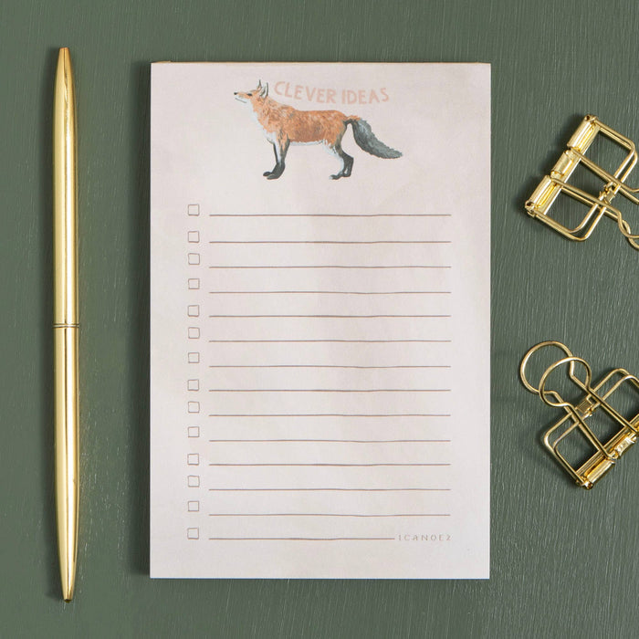 Clever Ideas Notepad fox notepad on a green table at Addison West