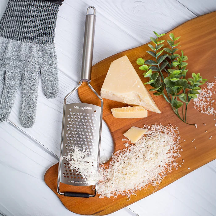 Microplane Professional Coarse Grater from the 1605 Peel, Zester, and Grater series with stainless steel blades for efficient food prep.