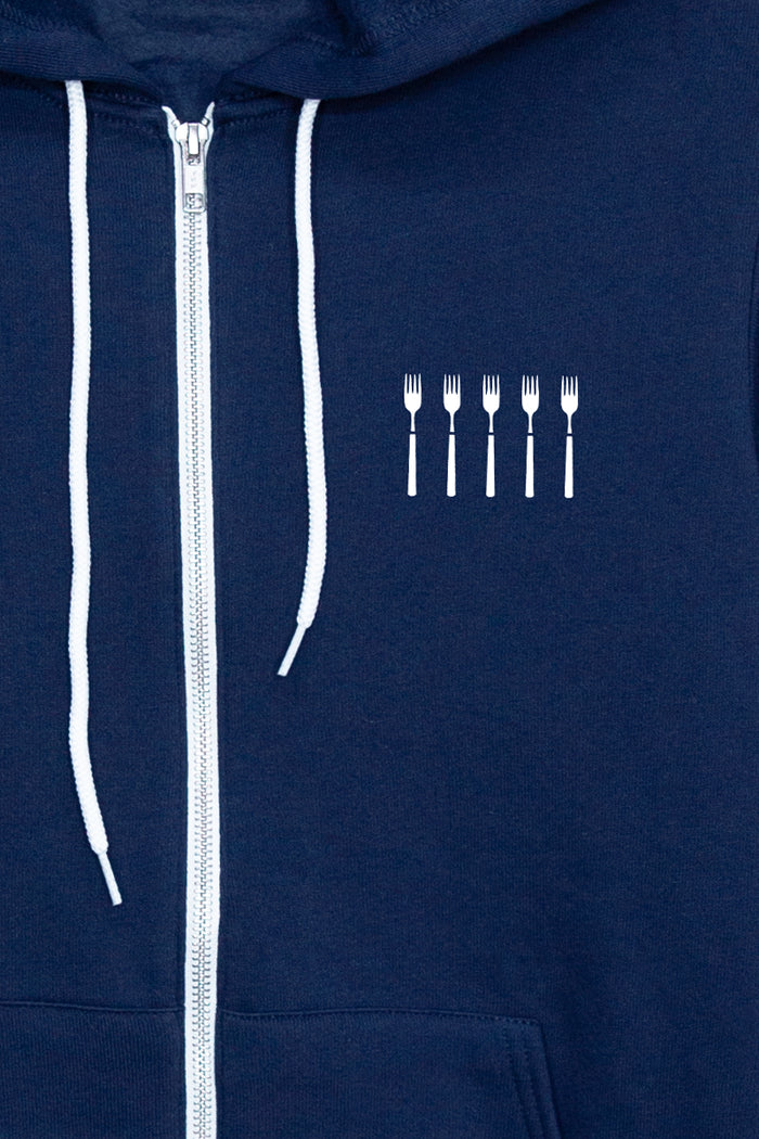 Navy zip-up Kin Ship Goods hoodie with small white fork design on chest, white drawstrings and zipper, laid flat on neutral background.