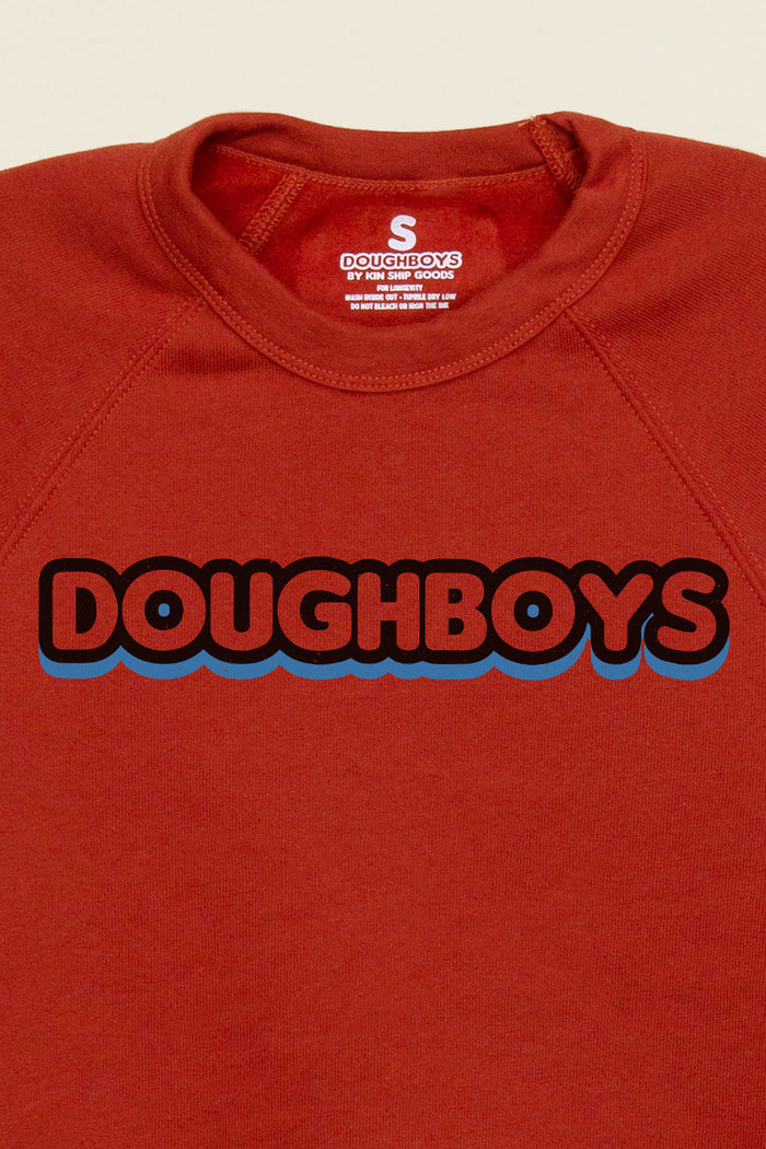Doughboys logo sweatshirt in rustic red – cozy unisex fleece crewneck with bold retro typography. - Kin Ship Goods
