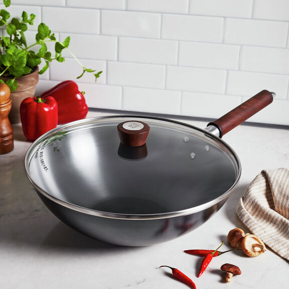 Zwilling Dragon Chinese Iron Wok 12-inch with sturdy handle, ideal for authentic stir-fry cooking and Asian cuisine.