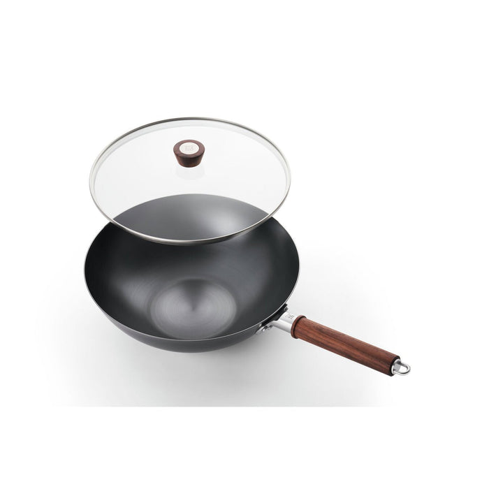 Zwilling Dragon Chinese Iron Wok 12-inch for traditional Asian cooking, featuring a durable cast iron design.