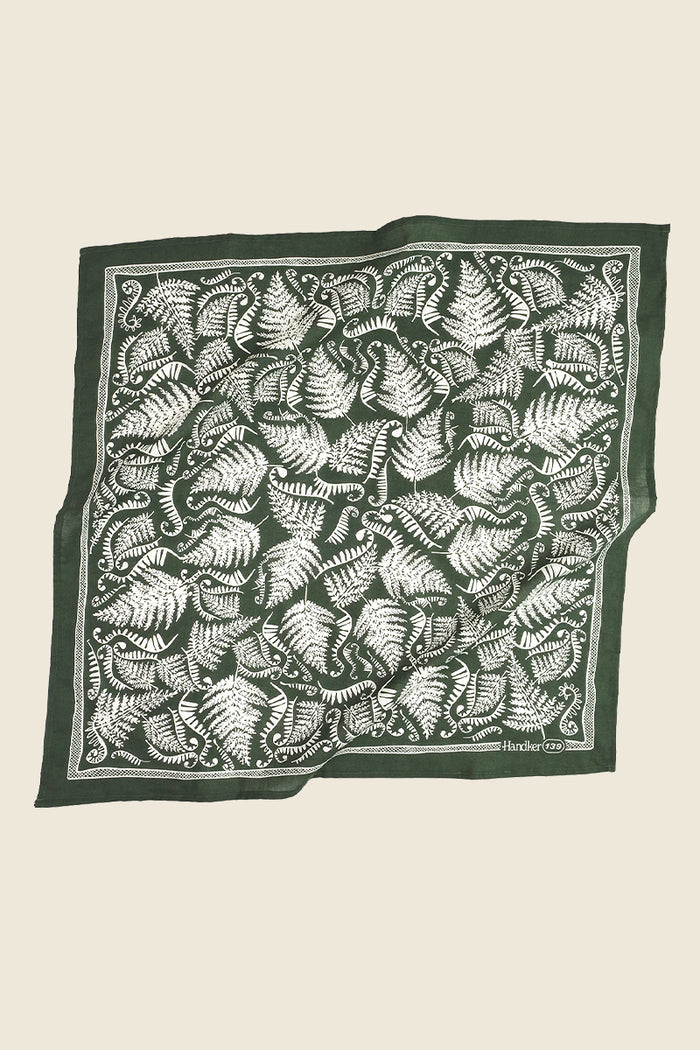 Kin Ship Goods fern bandana with white botanical print on dark green cotton-poly fabric for earthy, forest-inspired style
