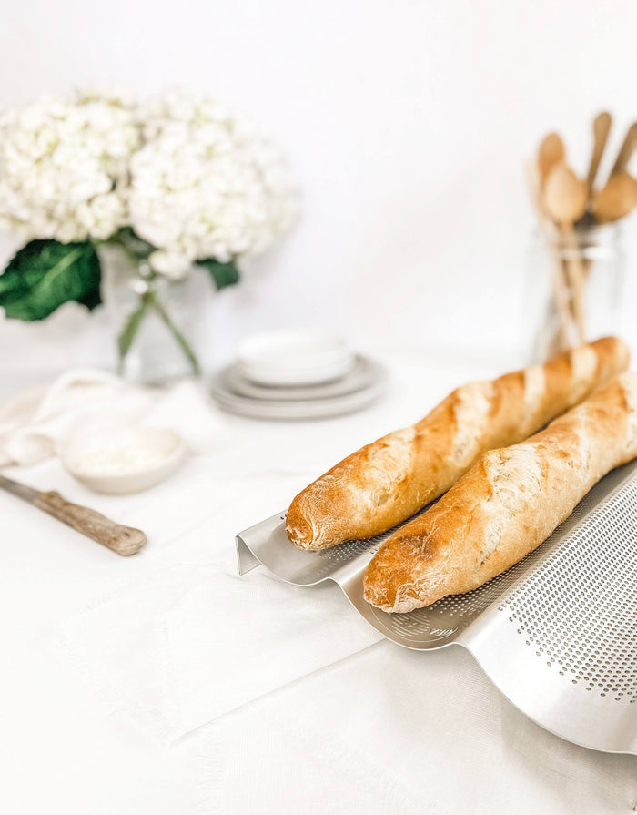 USA Pan French Baguette Pan for baking evenly shaped baguettes with non-stick surface and durable carbon steel construction.