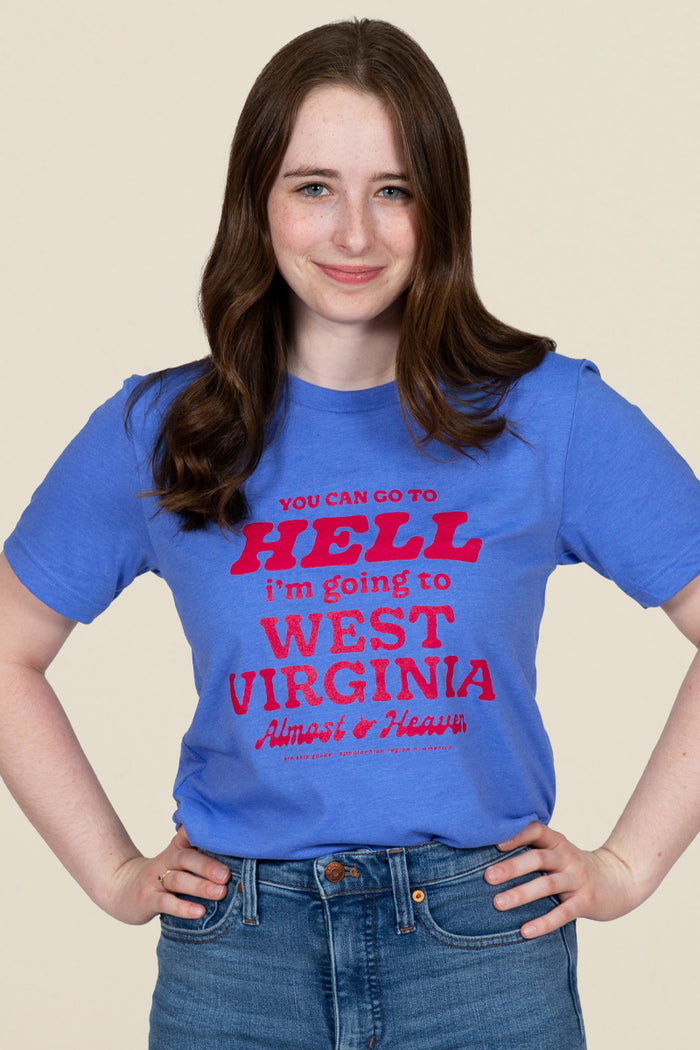 Kin Ship Goods blue tee with red text reading 'You can go to hell, I'm going to West Virginia. Almost Heaven.'