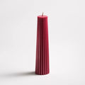 Greentree 8" Petite Pillar Candle in Bittersweet on a white background at Addison West