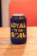 Kin Ship Goods “Loyal to the Soil” koozie with yellow West Virginia graphic on navy background—Appalachian pride drink holder.