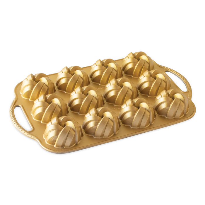 Mini braided Bundt pan by Nordicware, 1104 bread and cake pan with intricate braided design for baking mini Bundts.