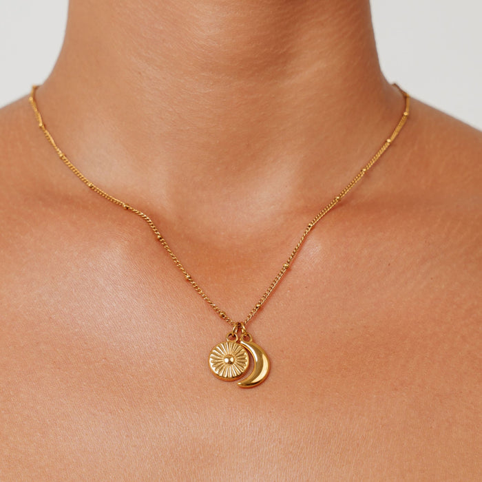 Moon and sun pendant