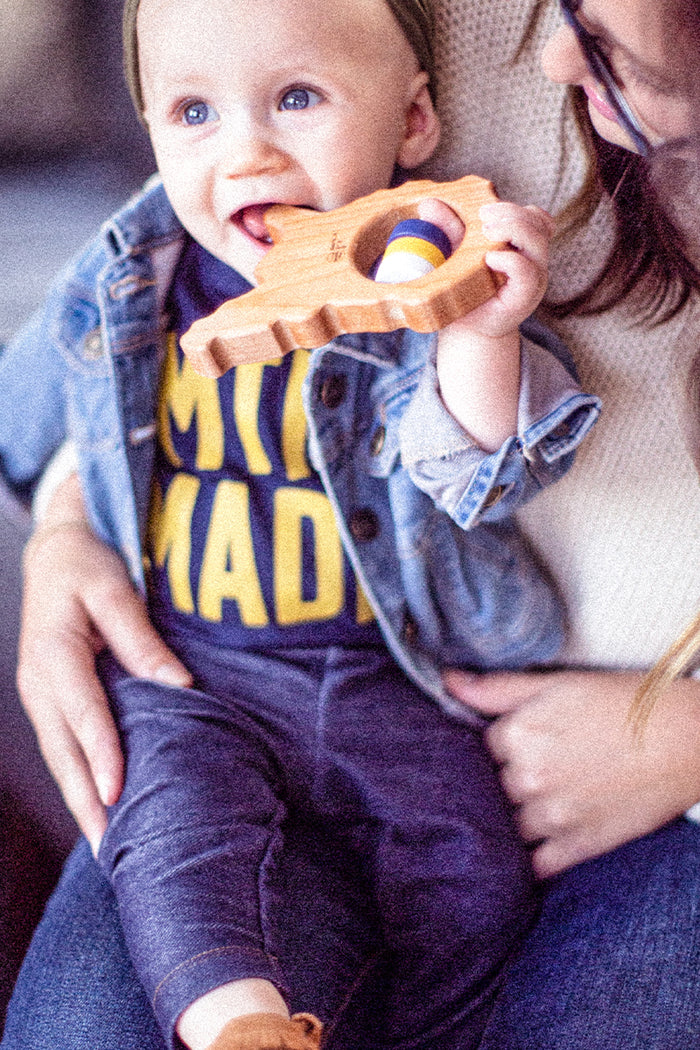 Kin Ship Goods navy baby onesie with bold gold ‘MTN MADE’ print, celebrating West Virginia roots and Appalachian pride.