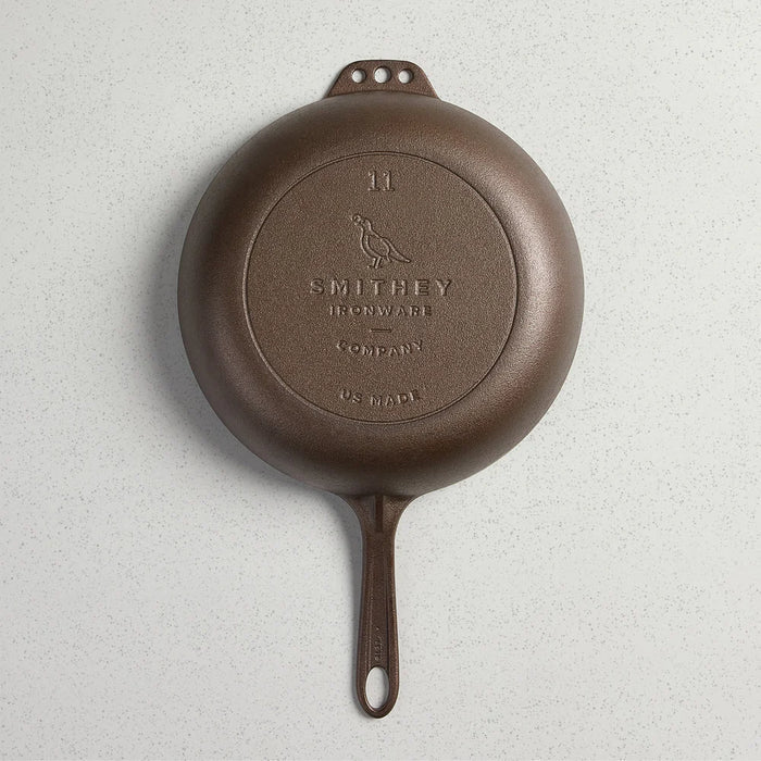 Smithey Ironware No. 11 cast iron skillet with glass lid, sturdy black skillet for frying and searing.