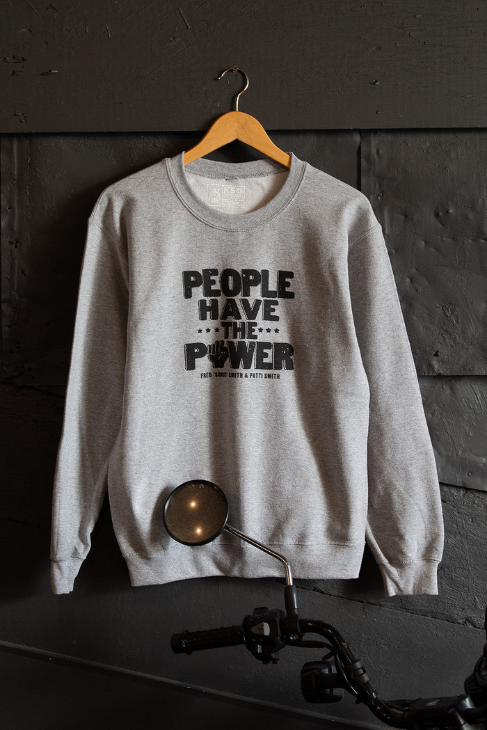 Kin Ship Goods heather grey sweatshirt with bold “People Have the Power” lyric design from our collab with Patti Smith.