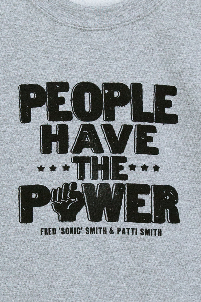 Kin Ship Goods heather grey sweatshirt with bold “People Have the Power” lyric design from our collab with Patti Smith.