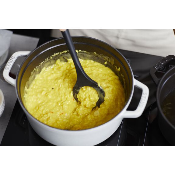 Staub Risotto Spoon from 1616 Cooking Utensils collection, featuring a wooden handle and stainless steel head for stirring risotto.