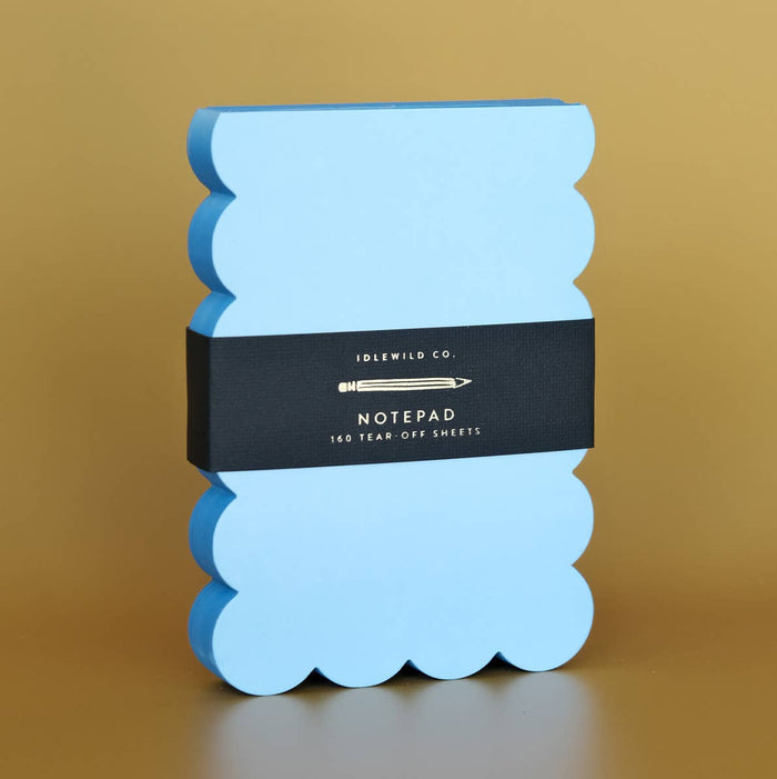 Scalloped Shaped Notepad in Aqua And Blue on a beige background at Addison West
