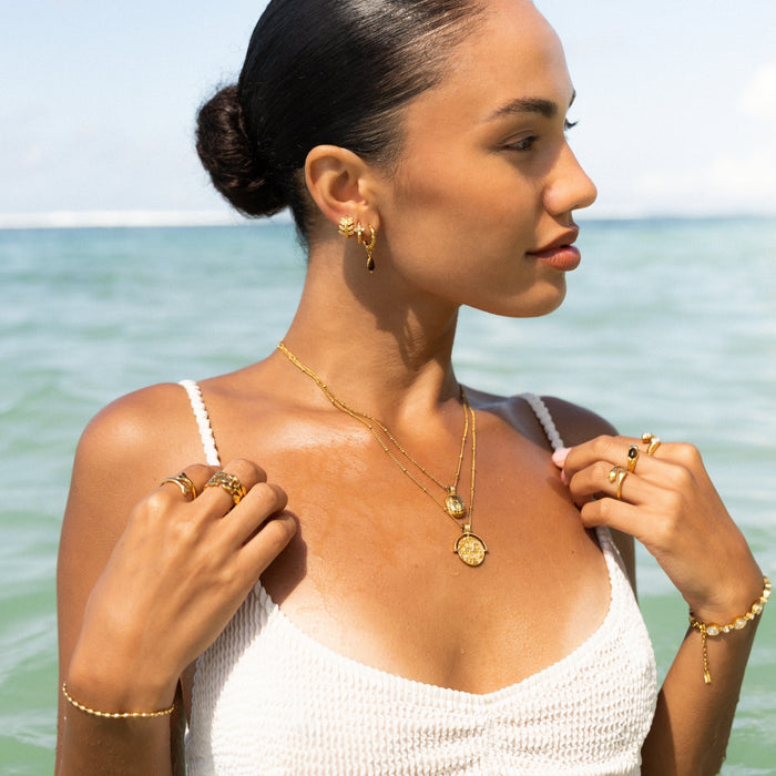 Symbolic Gold Charm Necklace