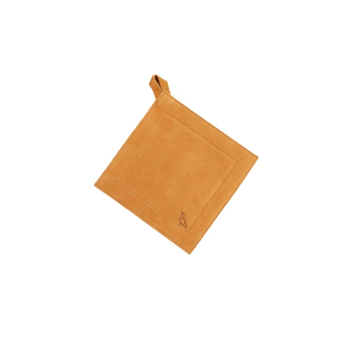 Smithey Ironware suede potholder with textured surface, designed for heat protection in kitchen cooking and baking tasks.