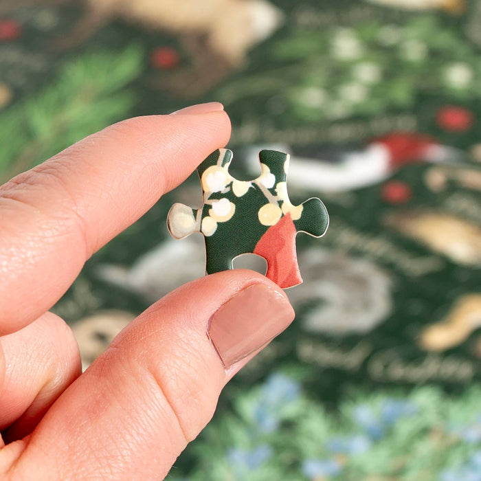 Winter Flora & Fauna 1,000 Piece Puzzle held by a model at Addison West