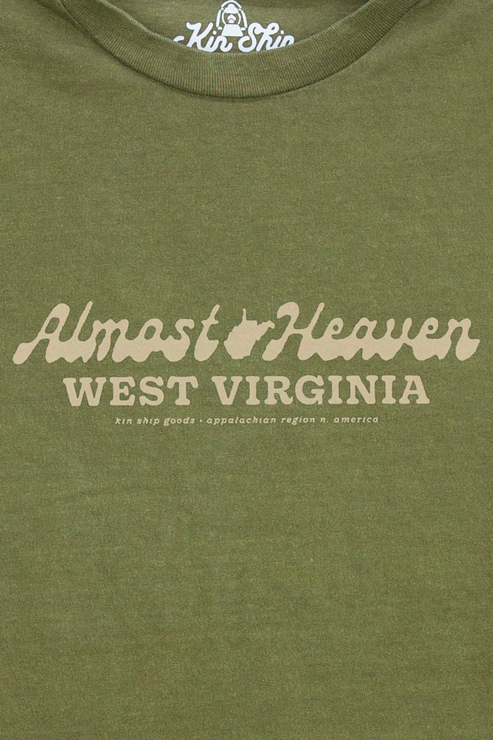 Kin Ship Goods olive green t-shirt with 'Almost Heaven West Virginia' text in vintage script across the chest.