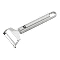 Zwilling Y Peeler for efficient vegetable peeling, part of the 1605 peelers, zesters, and graters collection, shown in use.